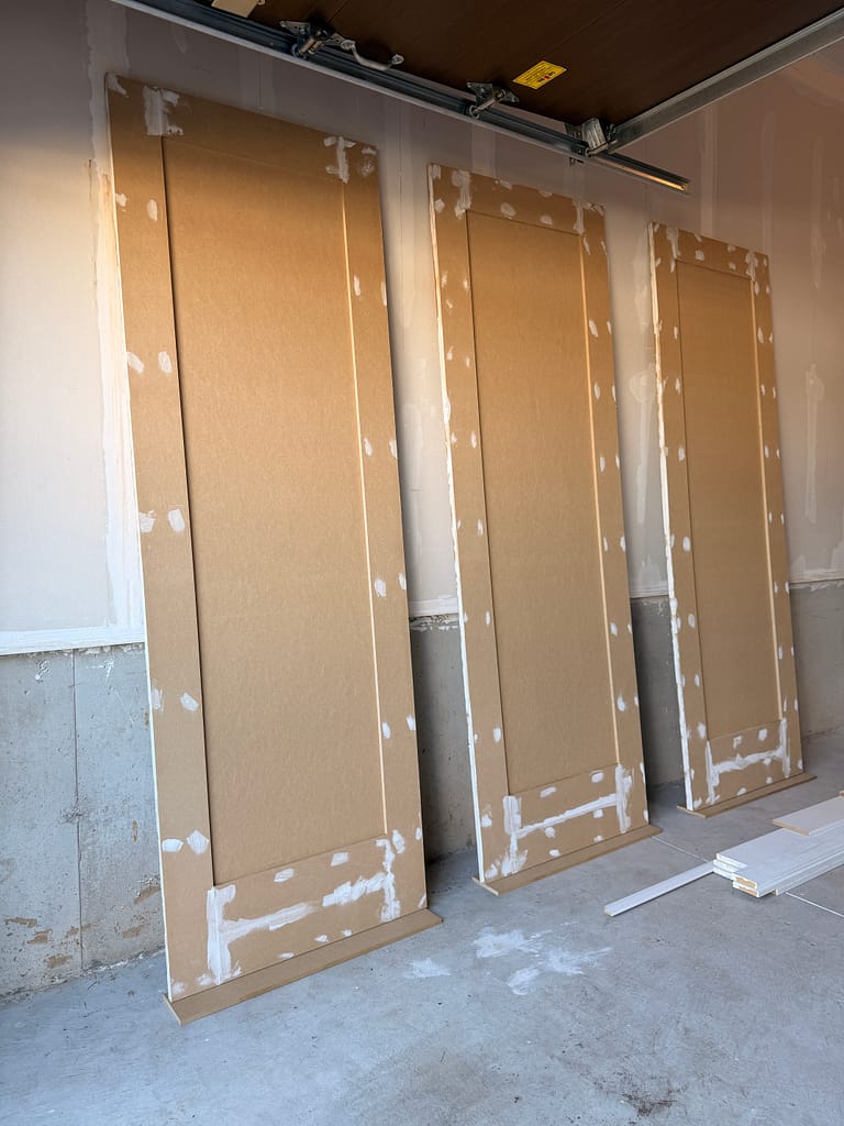 Custom shaker closet doors being prepared by Wood Job Finish Carpentry for a Hamilton condo