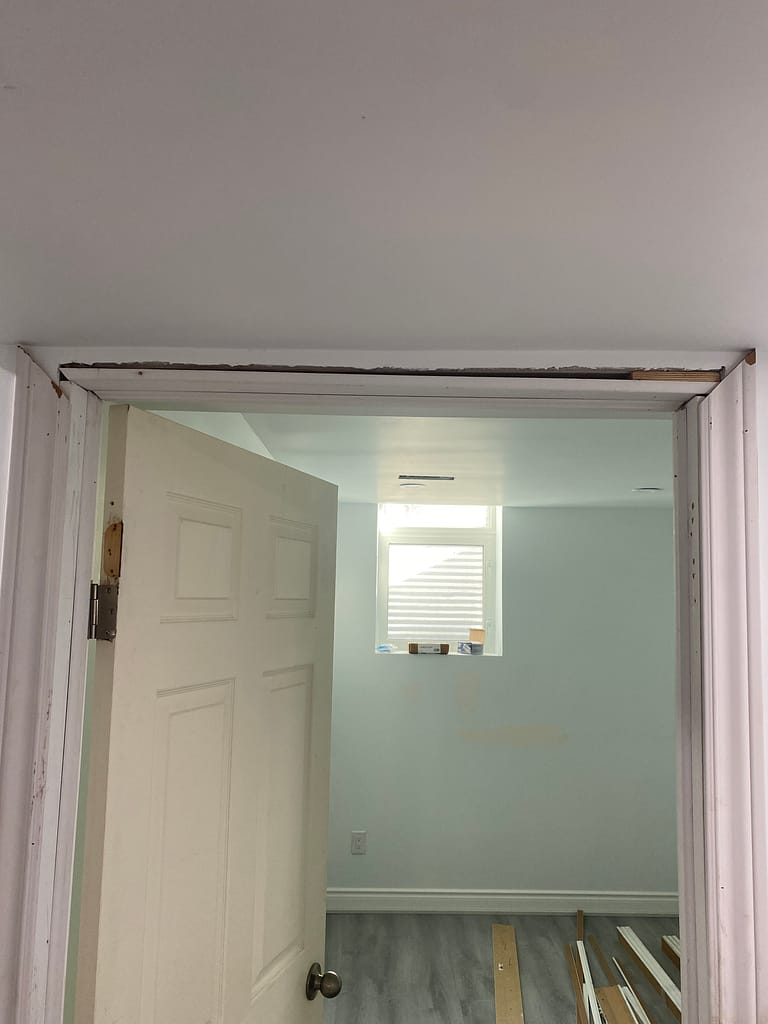 Casing and trim issue before repair in Kitchener door project