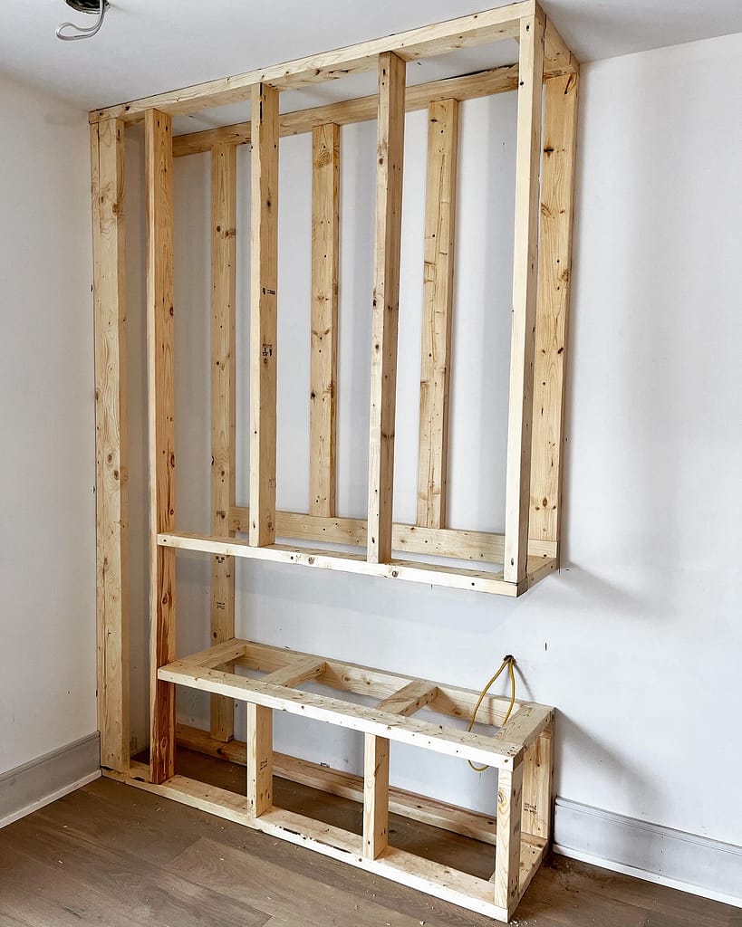 a modern fireplace framing installed by a finish carpenter at Wood Job Finish Carpentry in a Toronto bungalow renovation